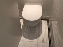 WC seen from bathroom, door open