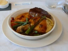 BA287 Fillet of Herefordshire beef with smoked garlic mash, green beans and artichokes