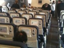 View on Upper Deck from rear looking forward on Air France A380. We received a drink on this short 42 minute flight!