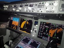 Dashboard 787.  That small square on the left with the aqua color on top and orange on bottom is what you look at if you're not using the Heads Up Display.