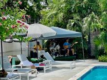 Band by pool bar on Saturday afternoon