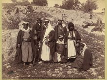 Bedouins pretending it's hot in the desert. But you can tell their faking it because look at all those clothes they're wearing!