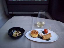Warm nuts, champagne, canapes (hot items were both hot and crisp, cold were served nice and chilled)