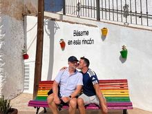 Even a tiny village has a gay pride bench! "Kiss me at this corner!"