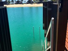 Stairs into the water from over water room