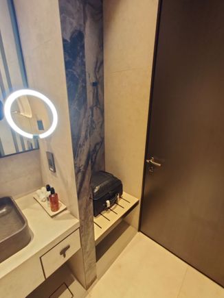 Contrary to another post, there is a shaver power point. No hair dryer. Not sure if this power point could support a Hair dryer.