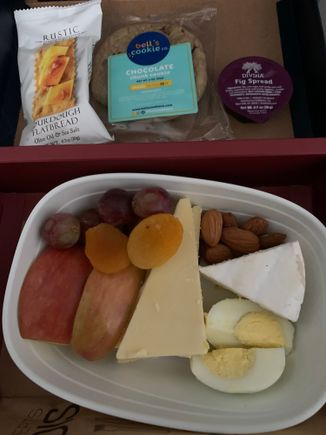Jfk to PlS.  PDB was a mini water bottle. No hot towels. No warm nuts.  Service was ok. WiFi didn’t work and IFE limited. 

I fear it will be the very same box choices on the way home. 