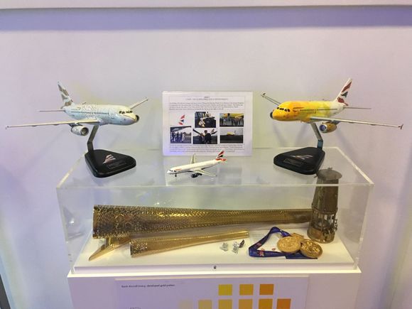 Information about the yellow painted plane used to carry the Olympic flame back in 2012. 