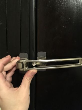 I need to hold this in place to stay like this - even as that, the door hook doesn't attach.