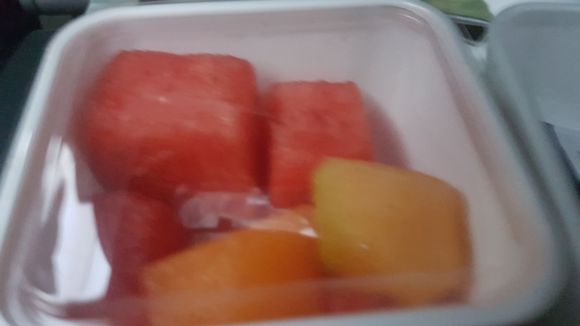 Relatively decent portion of fruit. Some airlines give you a "tasting" option where you get 1 of each type of fruit only!! 
