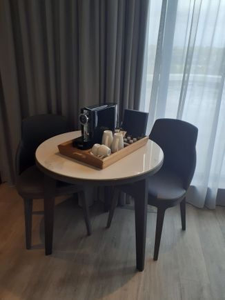 Room 319 Dining Table and Nespresso machine