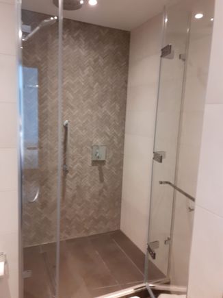 shower  ( you have to push the button to turn on and off the rain head and hand held shower)