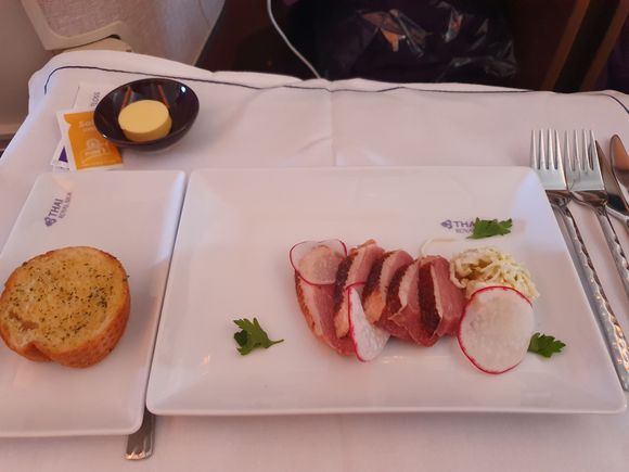 Entree was smoked duck which I had with garlic bread.