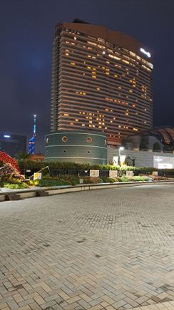 Hilton fukuoka (beside the mizuho pay pay baseball dome) with the fukuoka tower behind the hilton

