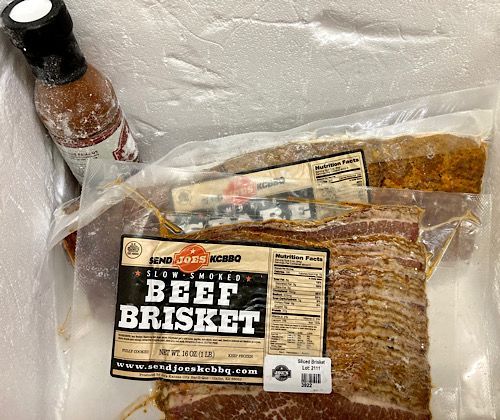 Two slabs of ribs, a pound of brisket, and a bottle of sauce all frozen cold. 