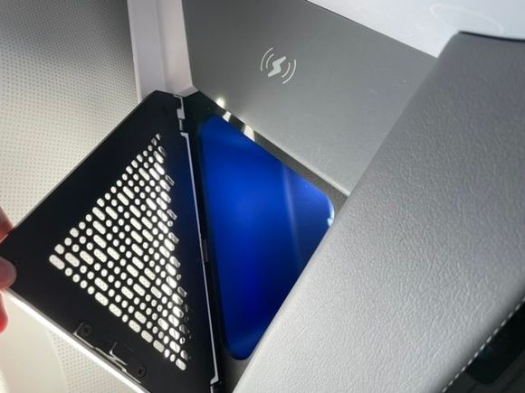 Plenty of storage and a wireless phone charger! (Note, the flight attendants seem to control if the charger is turned on or off; if it isn’t working, ask them to turn it on. Mine also turned off automatically during take off, but I’m not sure if that was intentional.)