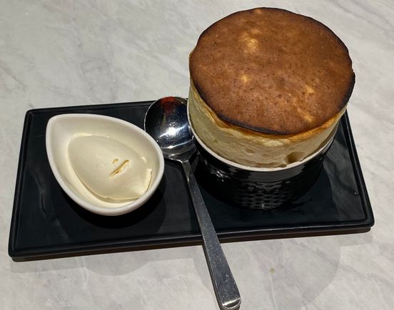 Sweetcorn soufflé with popcorn ice cream 