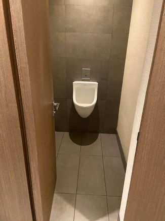 Public bathrooms have private urinals. Nice. Lol 