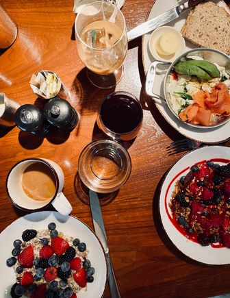 Bircher muesli, yogurt parfait and smoked salmon egg white scramble