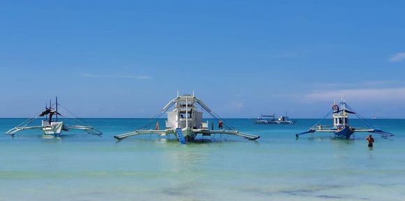 Talking of boats, here’s some in water off Boracay in the Philippines. Taken the day after typhoon Phanfone struck the island.