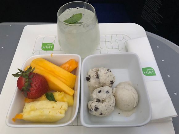 Sweet bites: fresh fruit (pineapple, strawberry, mango, and papaya) and ice cream (mint chocolate chip and vanilla)