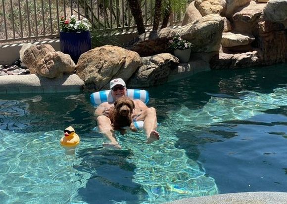 Poppy and me (and the duck) enjoying the pool! 