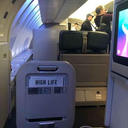 The mini-bulkhead in front of 63J/K, also taken from 62K. You get some idea of the space between rows 62/63. 