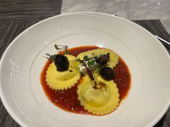 Ravioli…. I live in an Italian community…. We can argue about sauce all night… but it was good