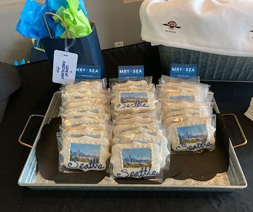 Champagne and other beverages, hors d’oeuvres, and cookies to celebrate the new route. 
