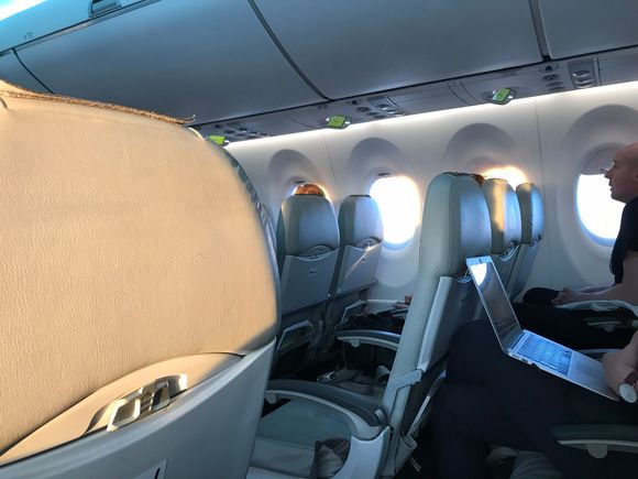 2-3 seating.  Spacious feel to the A220 cabin.