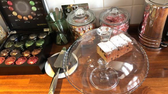 Cake and biscuits with coffee/tea in pantry on each floor.