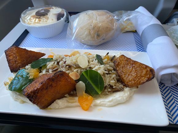 Today’s lunch EDI-LHR Pumpkin and Rice salad,didn’t think I would see this again so soon. However got my wish from my previous comment on this dish, pieces of pumpkin were larger and there was less rice.
Sweet was identified as trifle due to the piece of sponge therein, quite tasty but I could quite happily do without the DO&CO chocolate, a bit bitter for my taste.
Mrs B had the cold chicken with what was described as a curry sauce not as orange coloured as the last time.