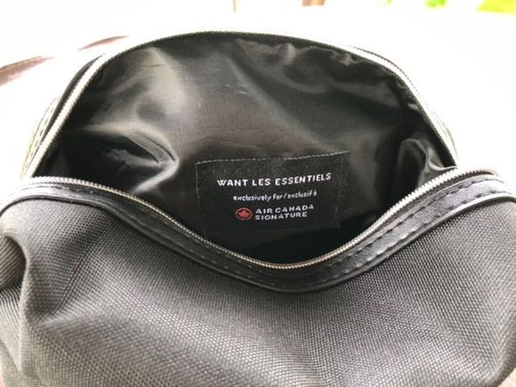 Lined inside of bag with tag.