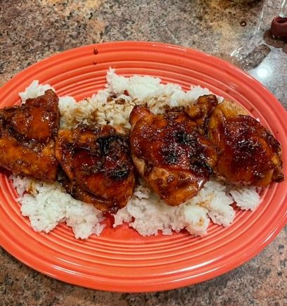 Soy/ginger/garlic/honey glazed chicken thighs over rice. 