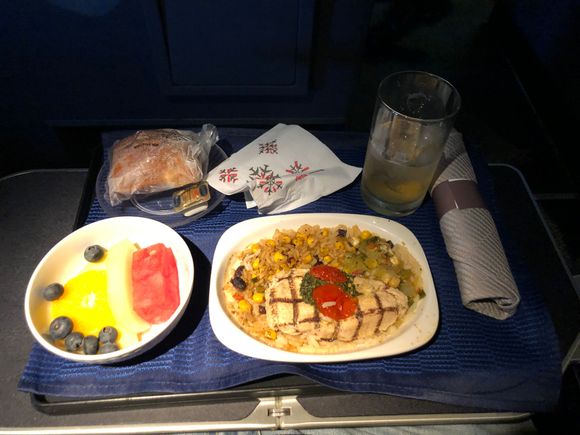 
Prior to my flight I received an email from United asking if I wanted to pre-order my meal. The options were chicken or Italian and that was it! And since my wife is Italian and I eat the best Italian food at home I opted for the chicken - which was dry and tasteless! The roll was so hard I couldn’t cut it in half      —— no really. After my first bite I knew why, it was incredibly dry so I passed.  Sadly the meal  was as expect for a domestic first class meal.