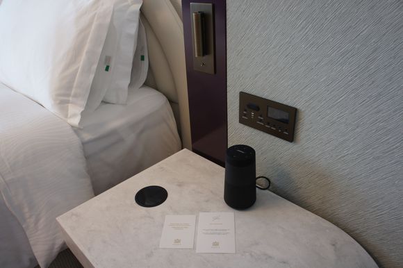 Wireless phone charging built into the bedside tables/consoles.