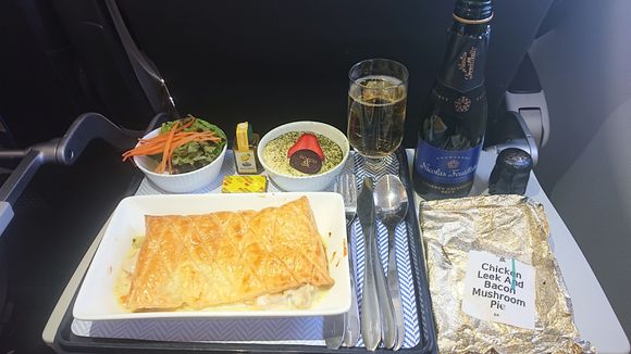 Touched down at LHR at 20:59. Wind was the issue as you all guessed correctly, on approach to FNC we held for 45 mins as gusts were at the top limit for landing, before diverting to FAO. Was expecting nothing more than a small filled roll for the return flight, was pleasantly surprised we received a full hot meal. Y pax received bread rolls and biscuits and nuts only. Hotels will be provided at BA's expense even though this was a weather related delay. Crew was excellent.  