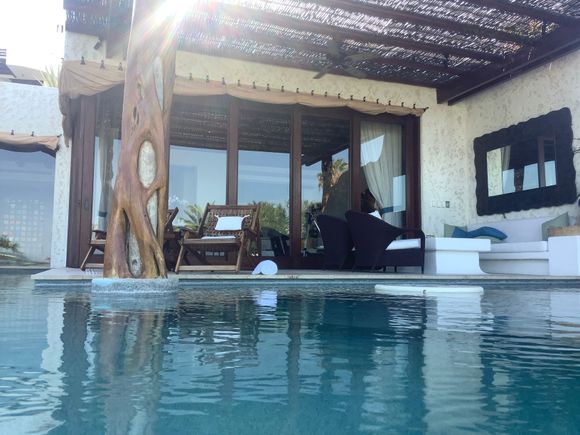 In the pool, looking to living room