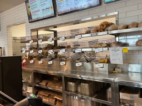 Partially stocked bagels.