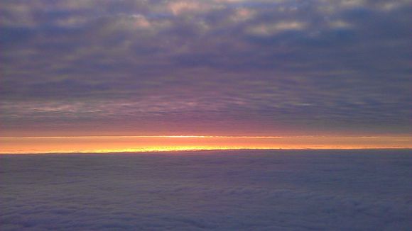 Atlantic sunset, probably somewhere between Greenland and northern Canada.