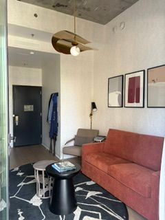 Living room and foyer with 1/2 bath