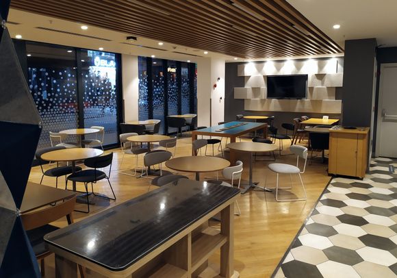 The breakfast area is beside the bar