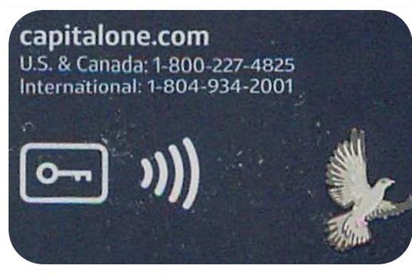 The key provides a one time password to authenticate the card when adding to a phone wallet or verification in the C1 app.   

It is in addition to the tap and pay symbol to the right.  C1 Venture X is the only card I have had with this symbol. 