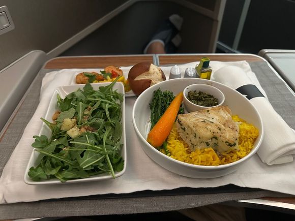 Pre-ordered the sea bass. Continues to be a winner. The salad was 95% arugula. 

The express meal came out quickly, which was helpful to maximize sleep. 