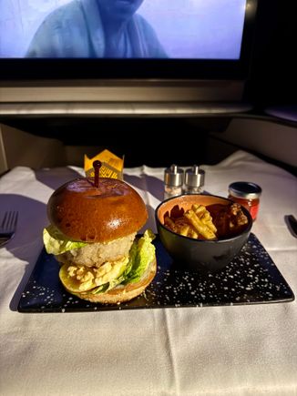 Before landing - Breaded prawn burger with toasted brioche bun pickled mooli and baby gem lettuce. This was surprisingly tasty! 9/10