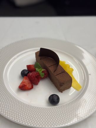 Almost immediately after they took that away, the chocolate bar arrived. He enjoyed this even more.