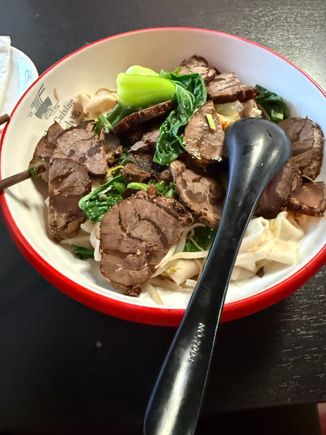Xi An for dinner.   I went with the hand pulled wide noodles with soy sauce and beef.  I also tried out their cumin lamb sandwich as well.  Didn’t much like the sandwich but the noodles were good 