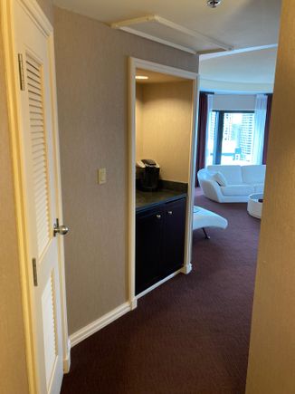 So let us take the right passage, you see the closet and hot beverage dispenser