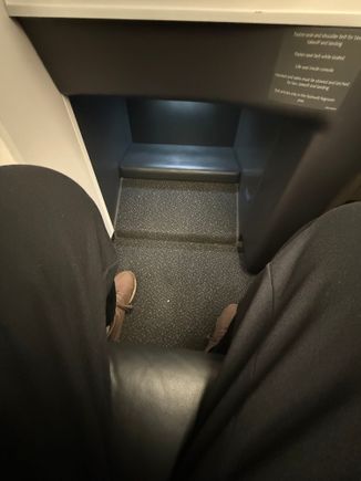 Spacious footwell on 1J.  My preferred seat as I do have size 13.5 feet 