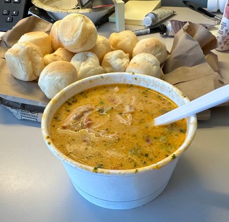 Chicken with hearts of palm soup and pao de queijo (Brazilian cheese puffs)